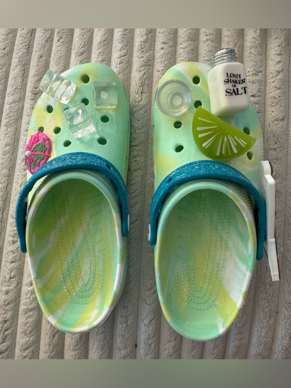 Margaritaville Crocs  in Mint Green with Teal Strap. Woman’s size 8 Men size 6.